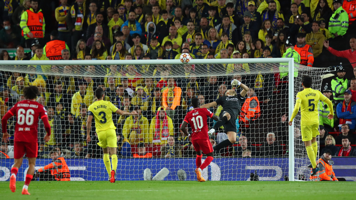 LIVERPOOL, ENGLAND - APRIL 27: Goalkeeper Geronimo Rulli of Villarreal fails to stop the ball from entering the net after it took a deflection from Pervis Estupinan following a shot by Jordan Henderson of Liverpool to make the score 1-0 during the UEFA Champions League Semi Final Leg One match between Liverpool and Villarreal at Anfield on April 27, 2022 in Liverpool, United Kingdom. (Photo by Robbie Jay Barratt - AMA/Getty Images)