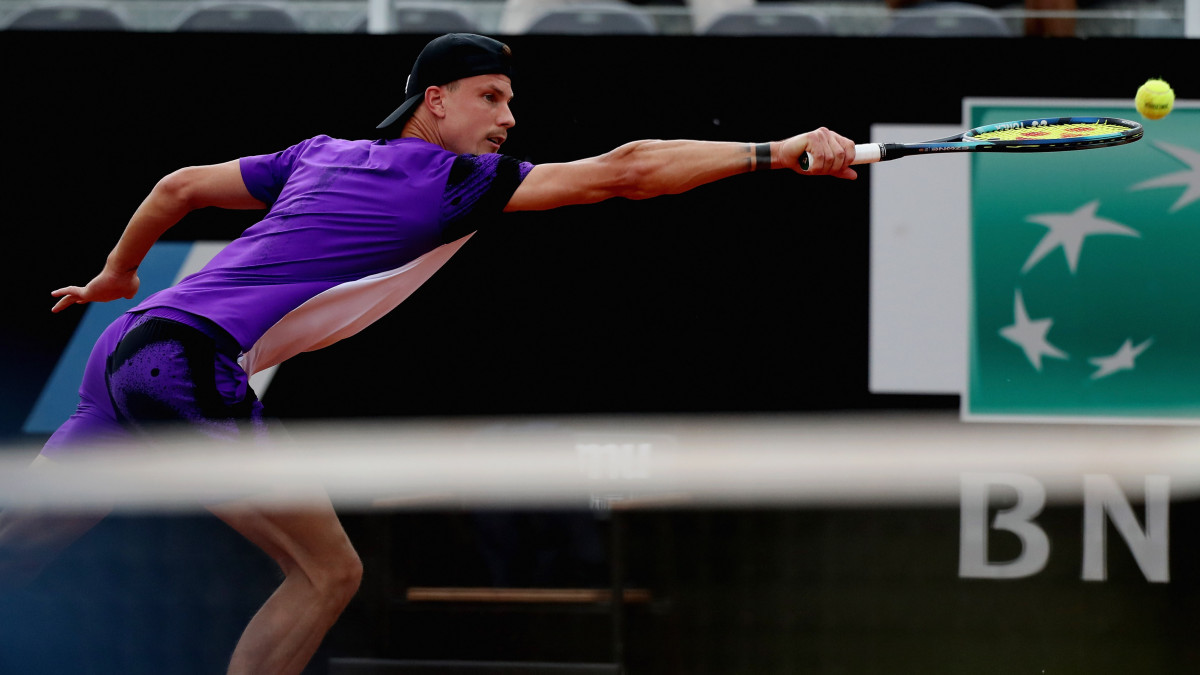 ROME, ITALY - MAY 08: Marton Fucsovics of Hungary in action during their mens singles qualifying second round match against Dusan Lajovic of Serbia on day one of the Internazionali BNL DItalia at Foro Italico on May 8, 2022 in Rome, Italy.  (Photo by Paolo Bruno/Getty Images)