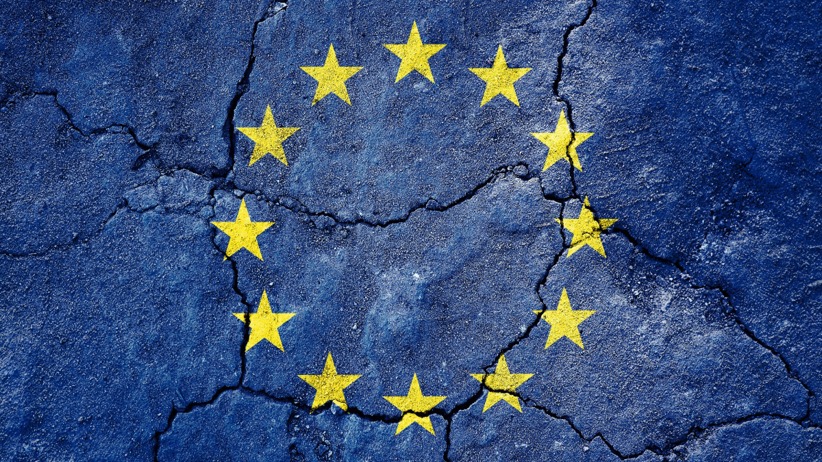 Grunge Flag of EU on cracked surface as background