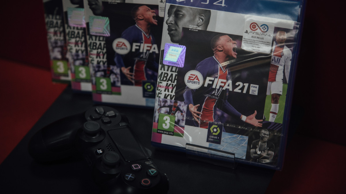 Copies of the FIFA 2021 soccer game, produced by Electronic Artists Inc., for the PlayStation 4 (PS4) console at a video games store in Paris, France, on Thursday, June 17, 2021. The reinstatement of Cyberpunk 2077 to the PlayStation store will helpÂ CD Projekt SAÂ with the marketing of games series but may not make much of a difference for its bottom line until a new version of the futuristic role-playing game is ready, according to BOS Bank SA analystÂ Tomasz Rodak. Photographer: Cyril Marcilhacy/Bloomberg via Getty Images