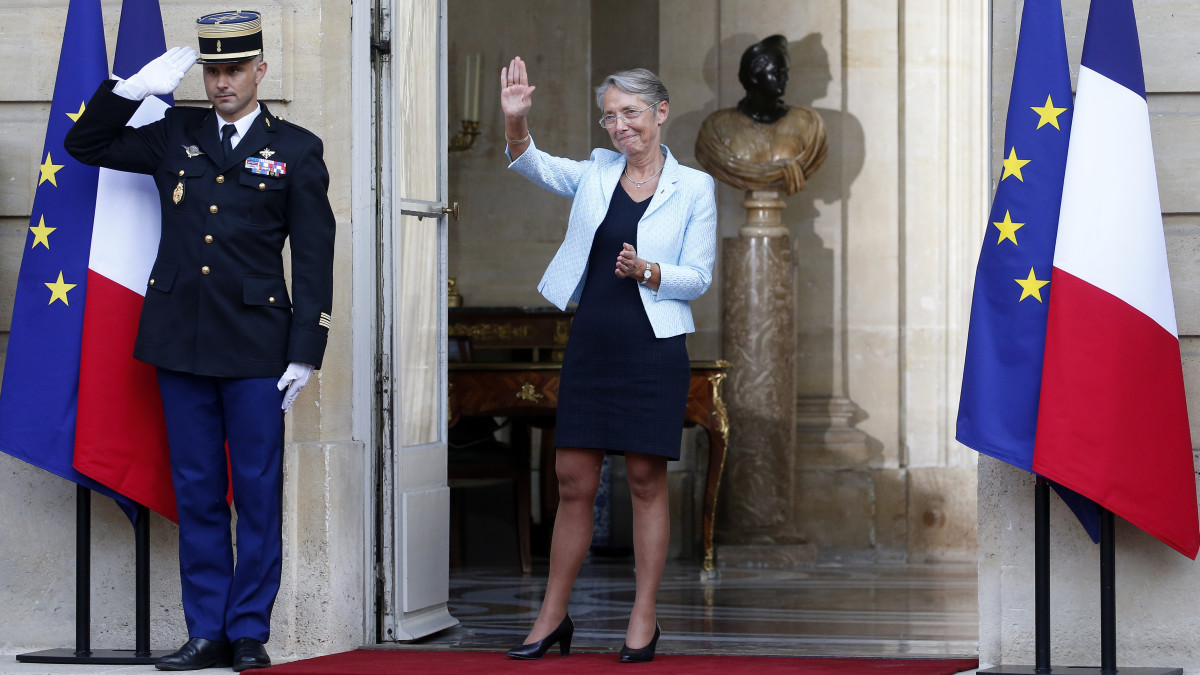 PARIS, FRANCE - MAY 16: Frances newly appointed Prime Minister Elisabeth Borne gestures as her predecessor leaves at the end of a handover ceremony in the courtyard of the Hotel Matignon on May 16, 2022 in Paris, France. Elisabeth Borne, 61, Minister of Labour, succeeds Jean Castex as Prime Minister, thirty years after Edith Cresson, a woman is once again entering the HĂ´tel de Matignon. Emmanuel Macron has appointed the Norman Elisabeth Borne Prime Minister, after the resignation of Jean Castex and his government two hours earlier. (Photo by Chesnot/Getty Images)