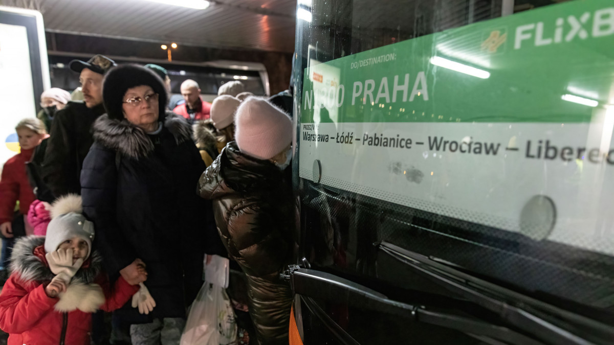 WARSAW, POLAND - 2022/03/08: Ukrainian refugees lining up for buses departing to Liberec, Czech Republic in Warszawa Zachodnia station.As war crisis in Ukraine continues, millions of Ukrainians have been fled from their homeland to Poland, most of them are women and children. Most of them temporarily resting in railway stations in Warsaw and awaiting resettlement, According to UN agency, the numbers of refugee migration have hit 1.5 million, which is the fastest-ever since the Second World War. The Polish government has announced a plan of 8 billion zloty ($1.7 billion) to aid the refugees. (Photo by Alex Chan Tsz Yuk/SOPA Images/LightRocket via Getty Images)