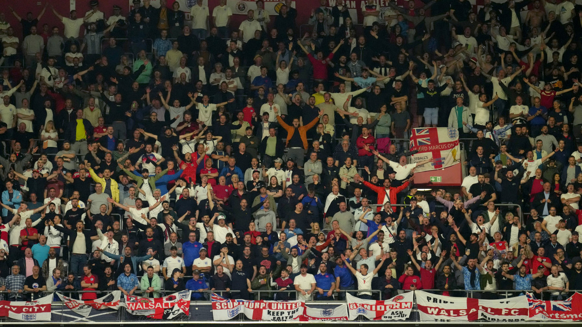 England fans celebrate in the stands after Harry Kane scores their sides first goal of the game from the penalty spot during the UEFA Nations League match at the Allianz Arena in Munich, Germany. Picture date: Tuesday June 7, 2022. (Photo by Nick Potts/PA Images via Getty Images)