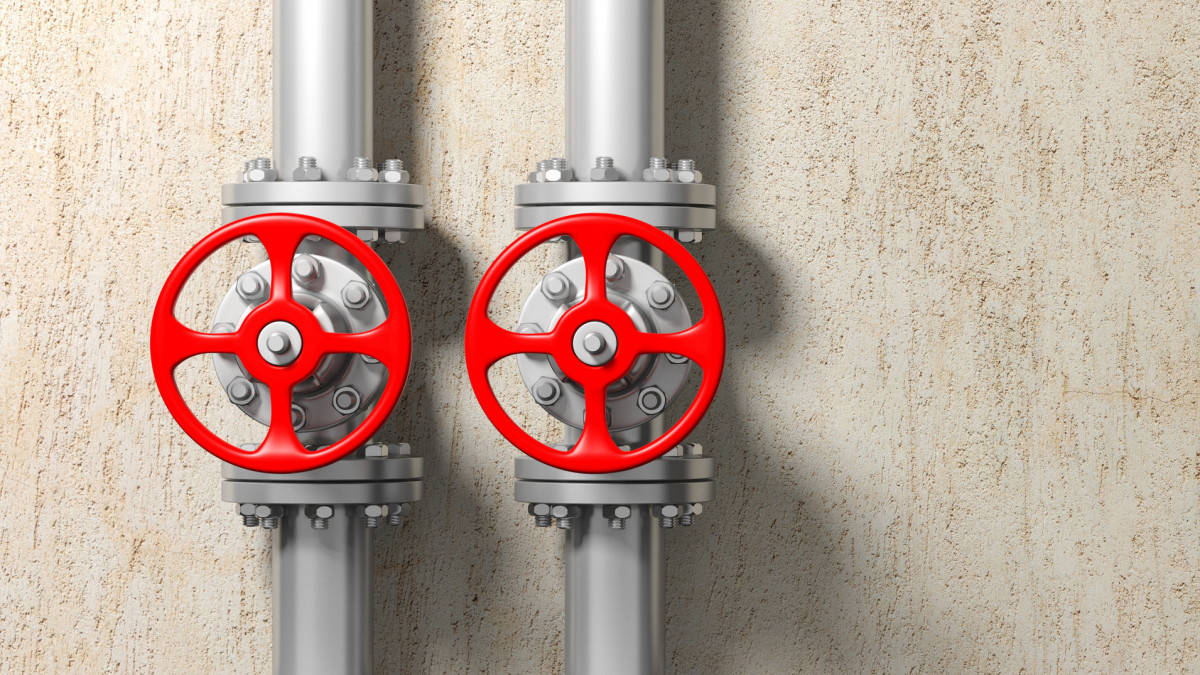 Two industrial pipelines and valves with red wheels on plastered wall background, banner, space for text. 3d illustration