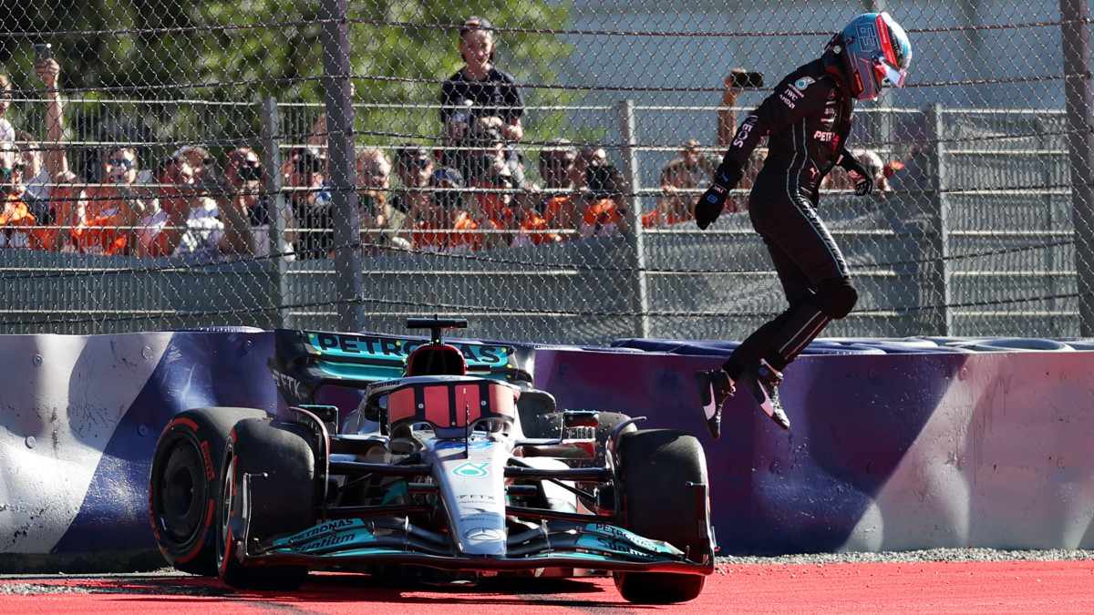 SPIELBERG, AUSTRIA - JULY 08: George Russell of Great Britain and Mercedes jumps from his car after a crash during qualifying ahead of the F1 Grand Prix of Austria at Red Bull Ring on July 08, 2022 in Spielberg, Austria. (Photo by Peter J Fox/Getty Images)