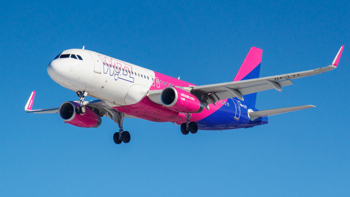 Moscow, Russia - March 26, 2019: Aircraft Airbus A320-232(WL) HA-LYT of Wizz Air against blue sky in sunny morning going to landing at Vnukovo international airport in Moscow