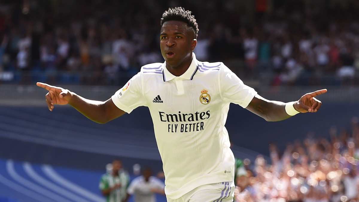 MADRID, SPAIN - SEPTEMBER 03: Vinicius Junior of Real Madrid celebrates after scoring their teams opening goal during the LaLiga Santander match between Real Madrid CF and Real Betis at Estadio Santiago Bernabeu on September 03, 2022 in Madrid, Spain. (Photo by Denis Doyle/Getty Images)