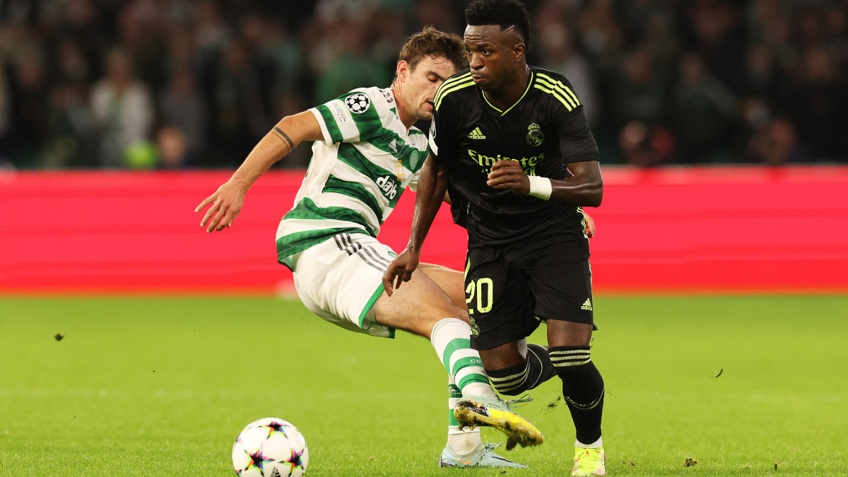 GLASGOW, SCOTLAND - SEPTEMBER 06: Vinicius Junior of Real Madrid is put under pressure by Matt ORiley of Celtic during the UEFA Champions League group F match between Celtic FC and Real Madrid at Celtic Park Stadium on September 06, 2022 in Glasgow, Scotland. (Photo by Ian MacNicol/Getty Images)