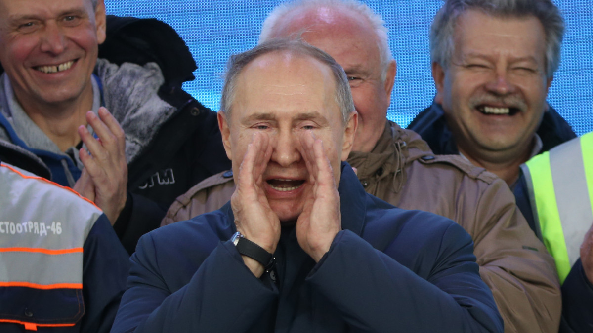 TAMAN, RUSSIA - DECEMBER 23:  Russian President Vladimir Putin talks during his meeting with workers after riding a train across the bridge linking Russia and Crimean Peninsula at Taman railways station on December 23, 2019 near Anapa, Russia. Putin on Monday inaugurated a raliway bridge to Crimea, the longest in Europe, which is intended facilitate links with Crimea, a disputed territory, which Russia annexed from Ukraine in 2014. (Photo by Mikhail Svetlov/Getty Images)
