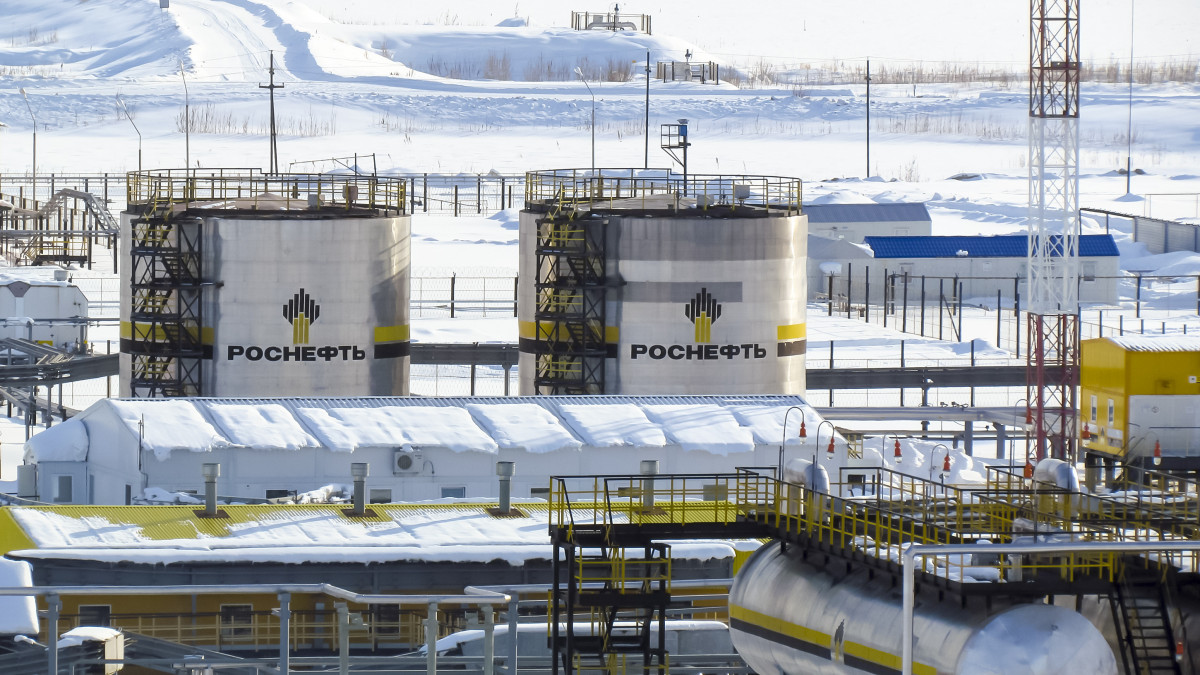 Russia, Nefteyugansk - January 24, 2016: A view of oil field equipment. Tanks with oil owned oil company Rosneft.
