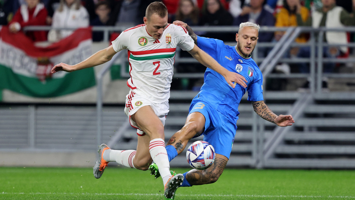 BUDAPEST, HUNGARY - SEPTEMBER 26: Adam Lang of Hungary battles for possession with Federico Dimarco of Italy during the UEFA Nations League League A Group 3 match between Hungary and Italy at Puskas Arena on September 26, 2022 in Budapest, Hungary. (Photo by Laszlo Szirtesi/Getty Images)