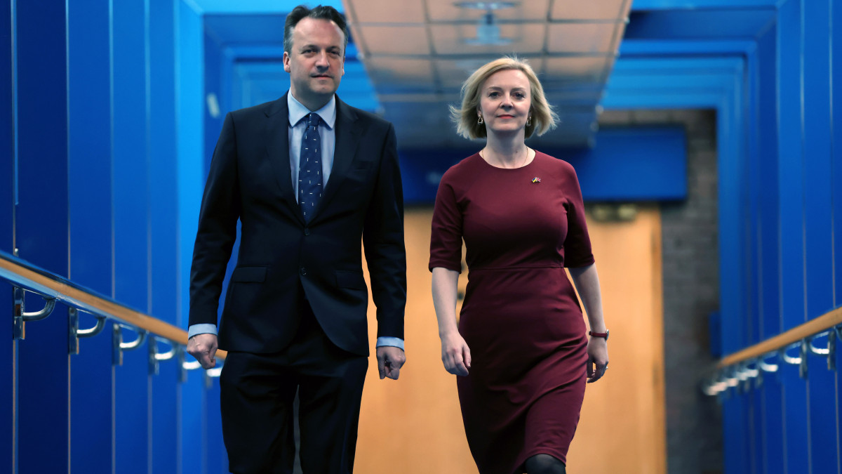 Liz Truss, UK prime minister, rights and her husband Hugh OLeary attend the Conservative Partys annual autumn conference in Birmingham, UK, on Sunday, Oct. 2, 2022. TrussÂ acknowledged her UK government mishandled the announcement on unfunded tax cuts which triggered a week of turmoil in financial markets, while insisting her approach is the correct one. Photographer: Hollie Adams/Bloomberg via Getty Images