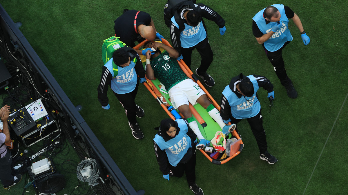LUSAIL CITY, QATAR - NOVEMBER 22: Yasser Al-Shahrani of Saudi Arabia is stretchered off after an injury during the FIFA World Cup Qatar 2022 Group C match between Argentina and Saudi Arabia at Lusail Stadium on November 22, 2022 in Lusail City, Qatar. (Photo by Buda Mendes/Getty Images)
