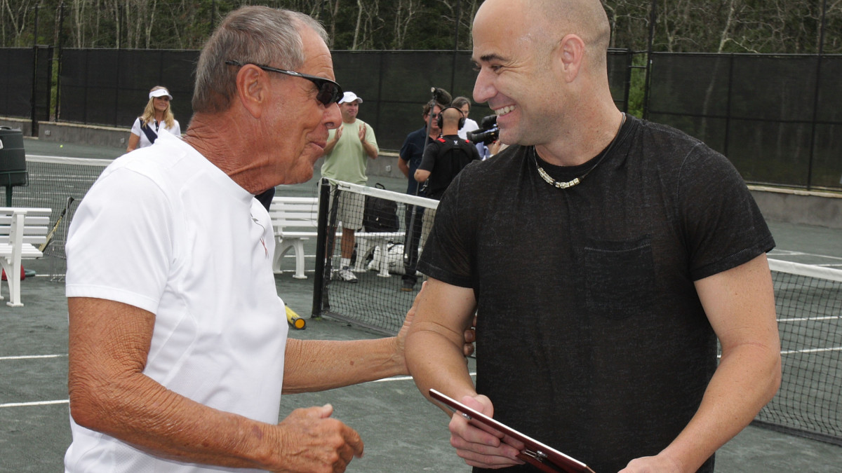 EAST HAMPTON, NY - AUGUST 30:  Tennis Coach Nick Bollettieri and Andre Agassi attend the Grand Slam Winners Tennis Exhibition Match at the Ross School Tennis Center on August 30, 2009 in East Hampton, New York.  (Photo by Jerritt Clark/Getty Images)