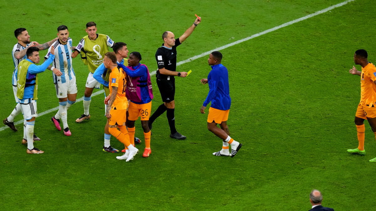 Netherlands Denzel Dumfries (far right) is shown a second yellow card before being sent off after the penalty shoot-out of FIFA World Cup Quarter-Final match at the Lusail Stadium in Lusail, Qatar. Picture date: Friday December 9, 2022. (Photo by Peter Byrne/PA Images via Getty Images)