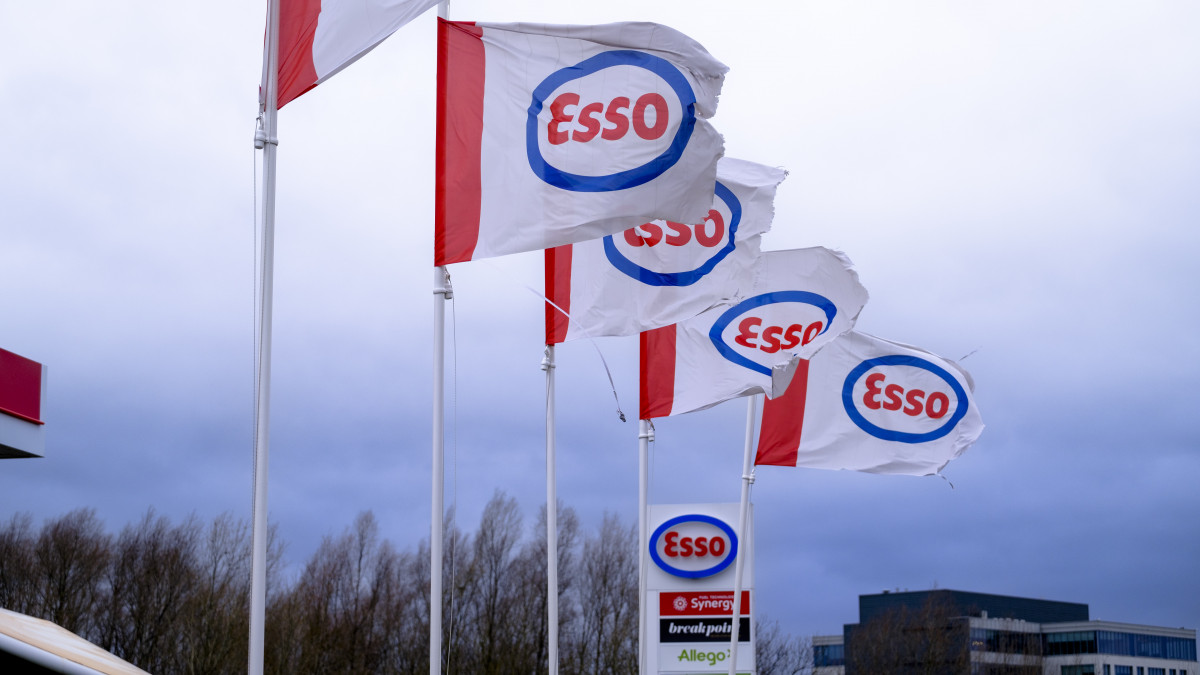 MACHELEN, FLEMISH BRABANT - DECEMBER 29: ESSO flags are seen on December 29, 2022 in Diegem, Belgium. Esso is a brand associated with the American oil company ExxonMobil. The name is derived from the initials of Standard Oil, when it was called, before 1911, Eastern States Standard Oil (ESSO). In 1972, this brand was largely replaced in the United States by the Exxon brand after purchasing Humble Oil, while Esso remained in widespread use elsewhere in the world. The American group ExxonMobil seized Wednesday the Court of Justice of the European Union against the tax on the superprofits of the energy giants decided by Brussels, which could according to the company discourage investments. Adopted at the end of September and officially called the temporary solidarity contribution, this charge is supposed to be paid by the producers and distributors of oil, gas and coal who have made enormous profits thanks to the surge in prices following the war in Ukraine. (Photo by Thierry Monasse/Getty Images)