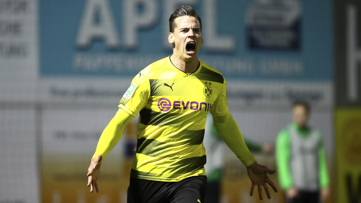 ROEDINGHAUSEN, GERMANY - APRIL 03: Balint Bajner of Dortmund celebrates after scoring his team`s first goal during the Regionalliga West match between SV Roedinghausen and Borussia Dortmund II at Haecker-Wiehenstadion on April 03, 2018 in Roedinghausen, Germany. (Photo by TF-Images/Getty Images)