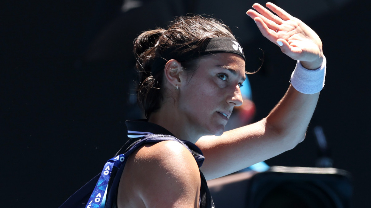 MELBOURNE, AUSTRALIA - JANUARY 23: Caroline Garcia of France waves to crowd in the fourth round singles match against Magda Linette of Poland during day eight of the 2023 Australian Open at Melbourne Park on January 23, 2023 in Melbourne, Australia. (Photo by Clive Brunskill/Getty Images)