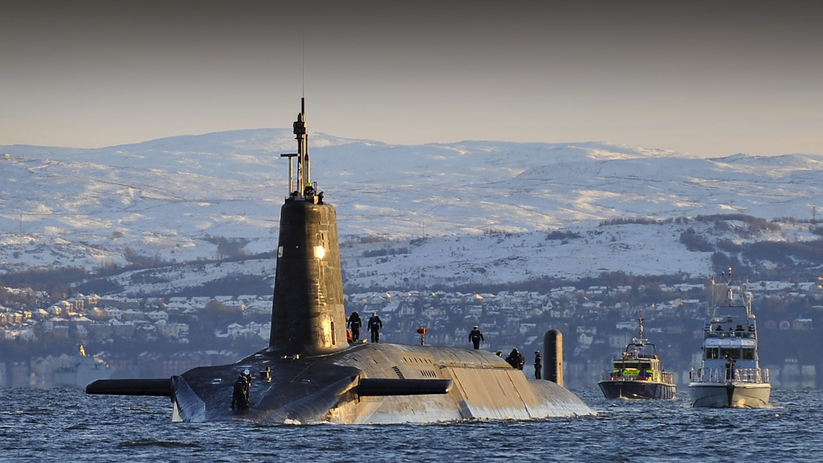 Nuclear submarine HMS Vanguard arrives back at HM Naval Base Clyde, Faslane, Scotland following a patrol.