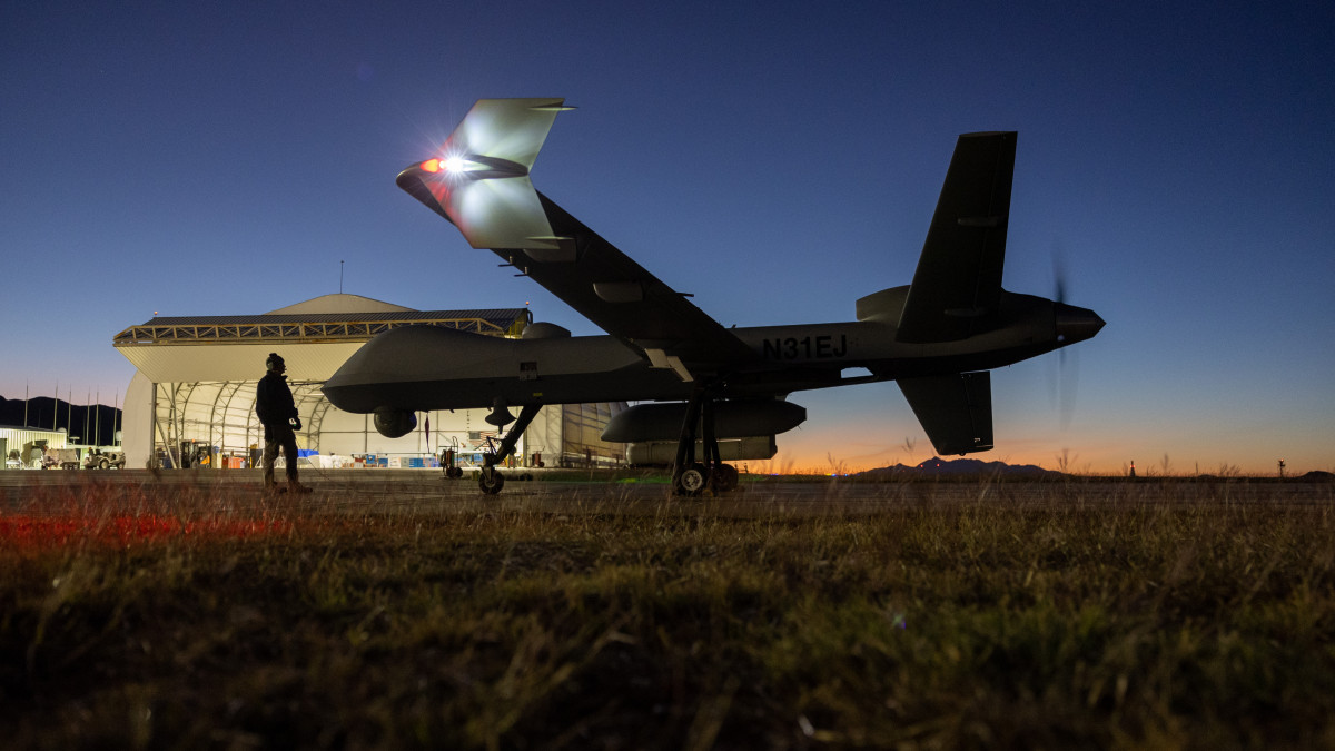 FORT HUACHUCA, ARIZONA - NOVEMBER 04: An MQ-9 Reaper drone with Customs and Border Protection (CBP) returns from a mission over the U.S.-Mexico border on November 04, 2022 at Fort Huachuca, Arizona. CBP air interdiction agents with U.S. Air and Marine Operations (AMO) pilot the surveillance drones from the base to intercept immigrants crossing illegally from Mexico into remote and rugged areas of southeastern Arizona. (Photo by John Moore/Getty Images)