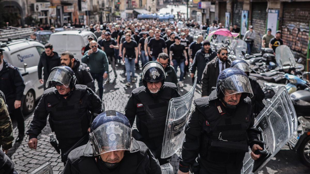 15 March 2023, Italy, Neapel: Soccer: Champions League, SSC Napoli - Eintracht Frankfurt, knockout round, round of 16, second leg. Italian police escorted Eintracht Frankfurt fans through the city center. Photo: Oliver Weiken/dpa (Photo by Oliver Weiken/picture alliance via Getty Images)