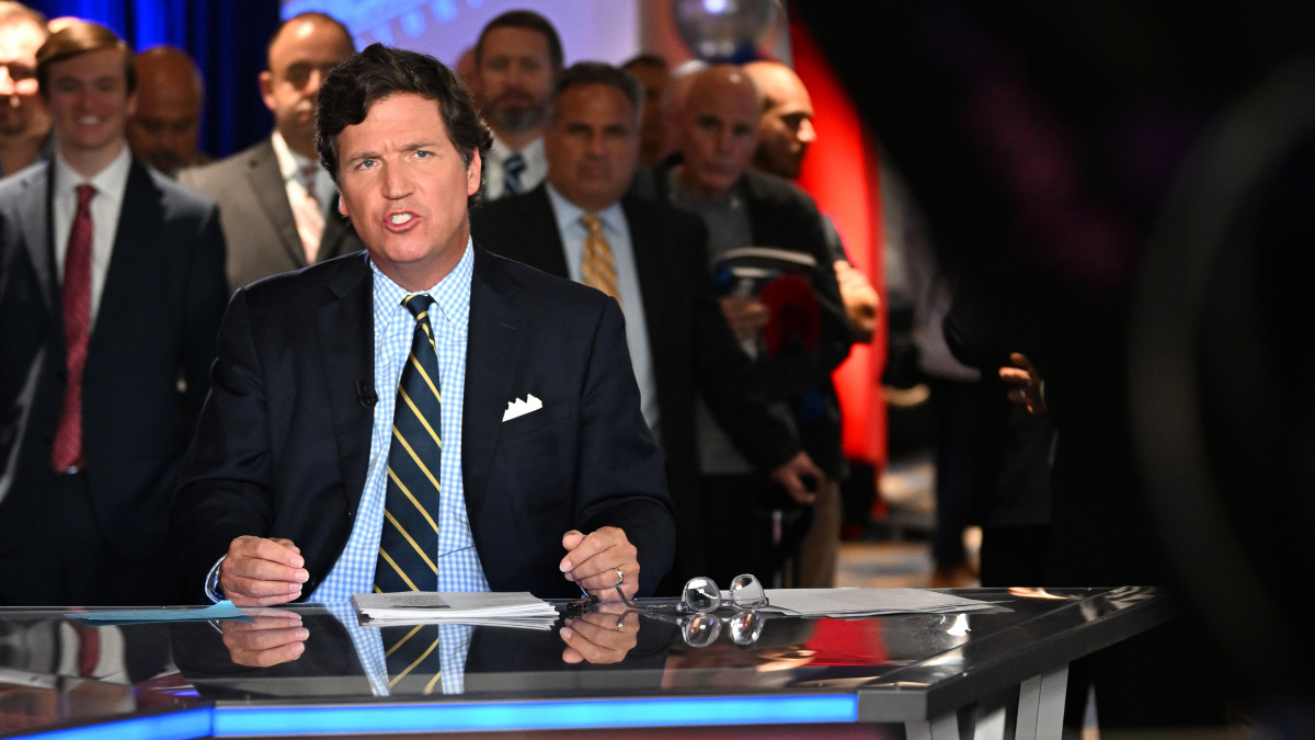 HOLLYWOOD, FLORIDA - NOVEMBER 17: Tucker Carlson speaks during 2022 FOX Nation Patriot Awards at Hard Rock Live at Seminole Hard Rock Hotel & Casino Hollywood on November 17, 2022 in Hollywood, Florida. (Photo by Jason Koerner/Getty Images)