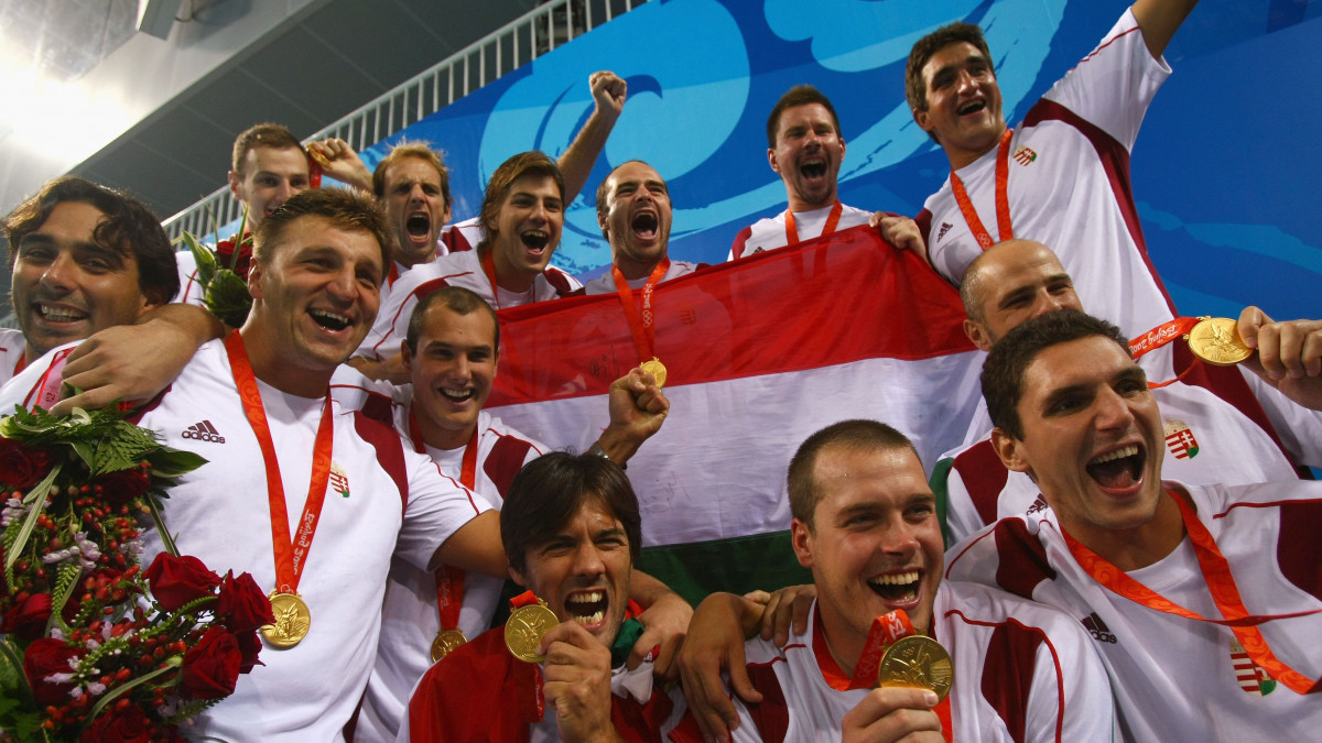 BEIJING - AUGUST 24:  Team Hungary celebrates on the podium after winning the gold medal by defeating the United States in the Mens Gold Medal Water Polo Match at the Yingdong Natatorium of National Olympic Sports Center during Day 16 of the Beijing 2008 Olympic Games on August 24, 2008 in Beijing, China.  (Photo by Lars Baron/Bongarts/Getty Images)