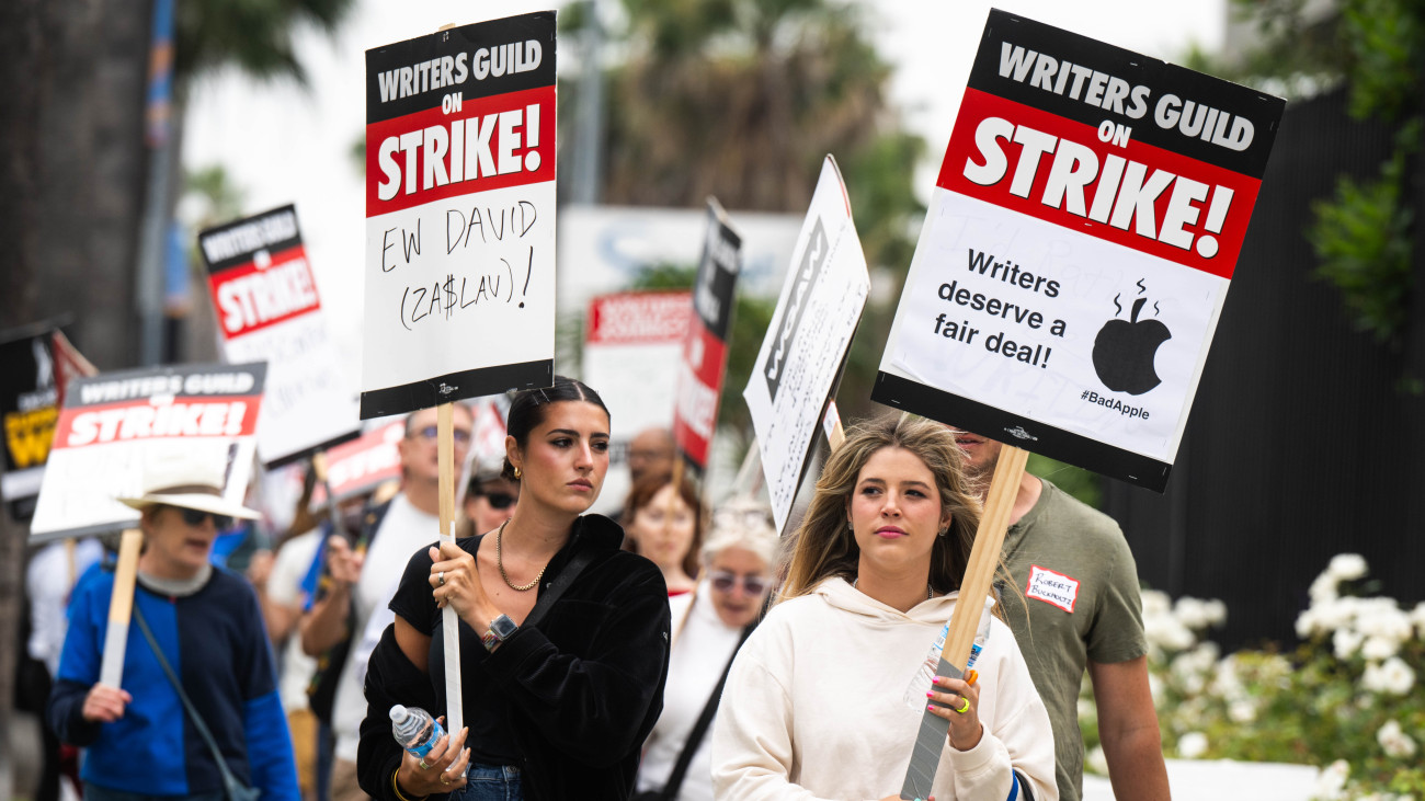 Hollywood, CA - June 14:Writers and their supporters walk the picket line at Netflix in Hollywood on Wednesday, June 14, 2023 during the seventh week of the Writers Guild of America strike. Writers unions from around the world picketed in support of the WGA on Wednesday. (Photo by Sarah Reingewirtz/MediaNews Group/Los Angeles Daily News via Getty Images)