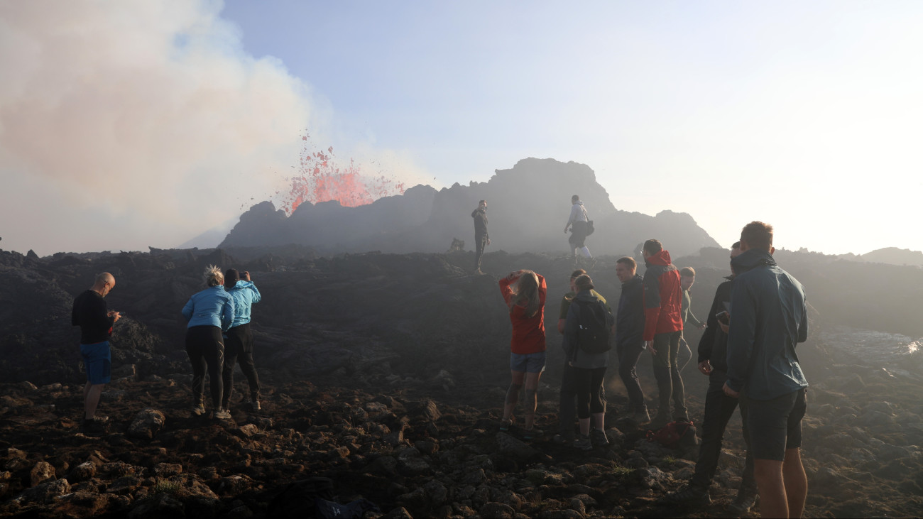 LITLI HRUTUR, ICELAND - JULY 11: Visitors come to see the volcanic activity near Icelands main airport on the second day of the eruption on July 11, 2023 in in Litli HrĂştur near Reykjavik, Iceland. (Photo by Micah Garen/Getty Images)