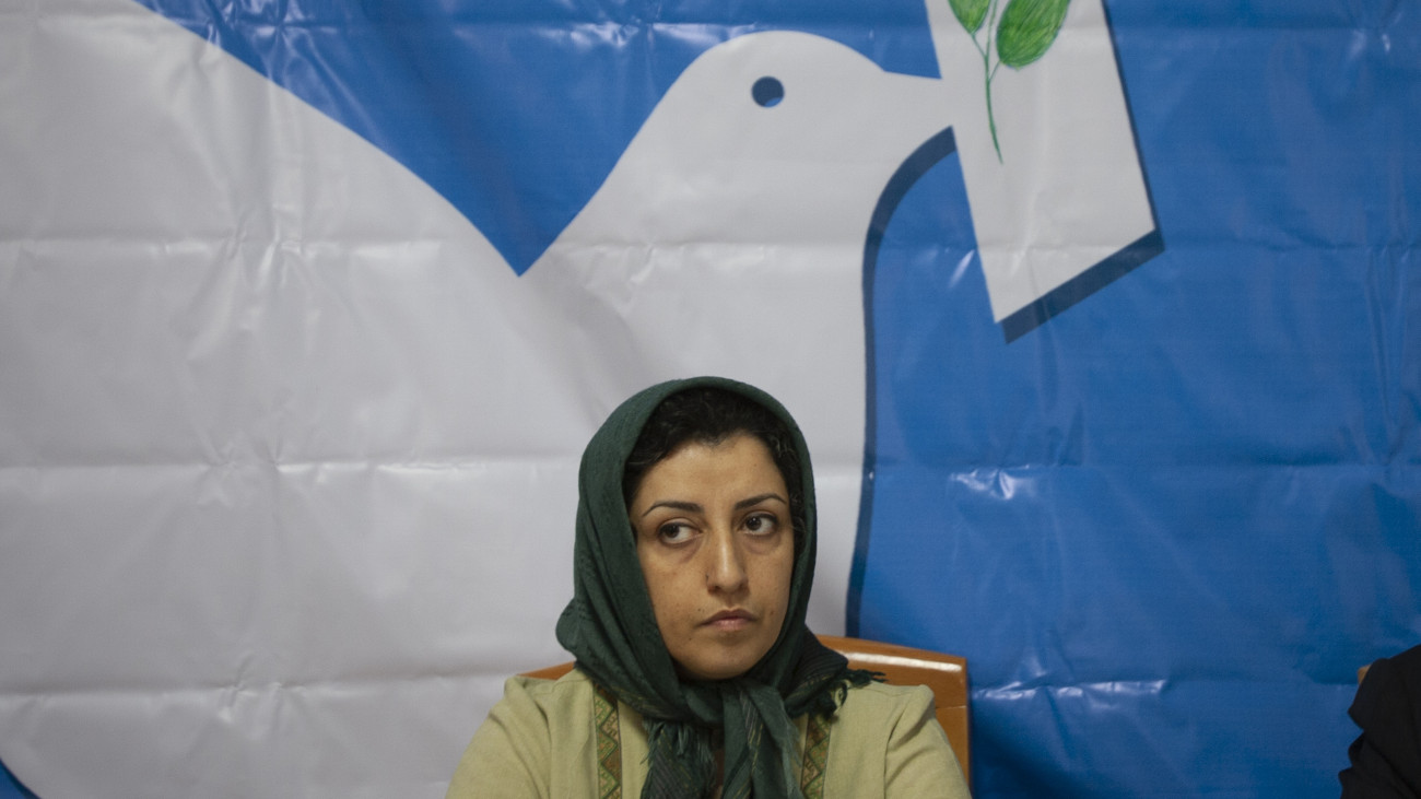 Iranian female human rights activist, Narges Mohammadi, looks on while attending a session in the former office of the Defenders of Human Rights Association in central Tehran, Iran on November 19, 2007. The group of 16 experts expressed grave concerns that Ms. Mohammadi appears to have contracted COVID-19 in Zanjan Prison. Ms. Mohammadi has been in detention since 2015 on charges that stem from her human rights work. She received a combined 16-year prison sentence in May 2016, of which she will need to serve 10 years under Iranian law, According to the office of the High Commissioners of the United Nations Human Rights. (Photo by Morteza Nikoubazl/NurPhoto via Getty Images)