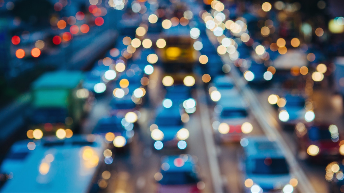 Defocused image of rush hour traffic on busy highway in the evening