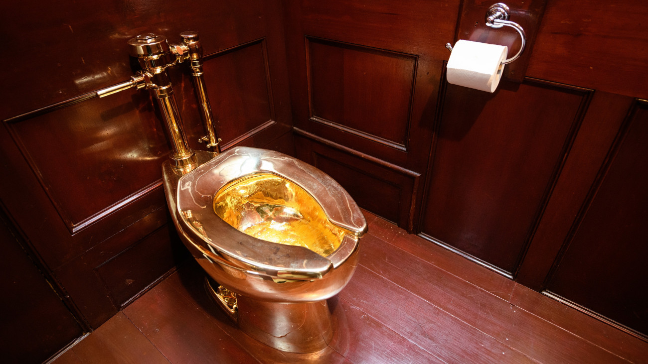 WOODSTOCK, ENGLAND - SEPTEMBER 12: America, a fully-working solid gold toilet, created by Maurizio Cattelan, is seen at Benheim Palace on September 12, 2019 in Woodstock, England. The artwork is still missing following what police believe to be a burglary on September 14, in which the toilet, valued by some at ÂŁ4.8million, was taken. In 1996, Cattelan famously stole the entire contents of one of his own exhibitions in Amsterdam but has strongly denied any involvement with this latest theft. (Photo by Leon Neal/Getty Images)