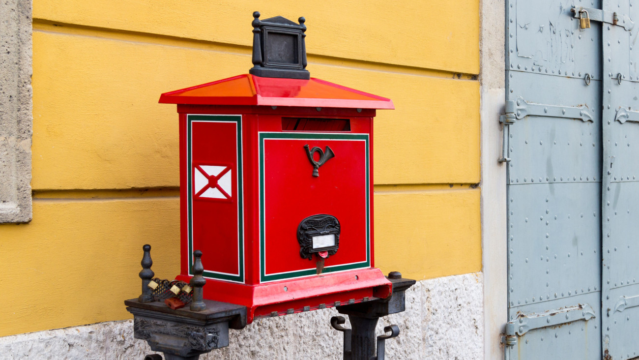 Traditional red street mailbox in Budapest, Hungary