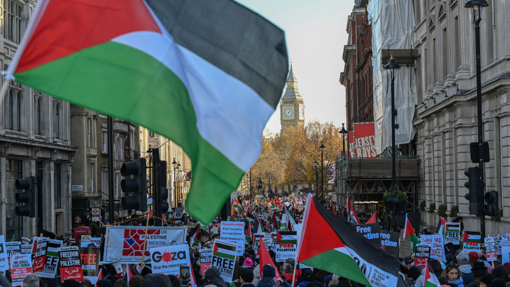 LONDON, UNITED KINGDOM - NOVEMBER 25: People gather to stage demonstration to show solidarity with Palestinians for the 7th time as they take to the streets every Saturday since Oct 14 in London, United Kingdom on November 25, 2023. Crowds assembled in front of Hyde Park, a symbolic location in the city, and proceeded to march towards the parliament building with demanding the humanitarian pause in the conflict to be transformed into a lasting and permanent ceasefire. (Photo by Rasid Necati Aslim/Anadolu via Getty Images)