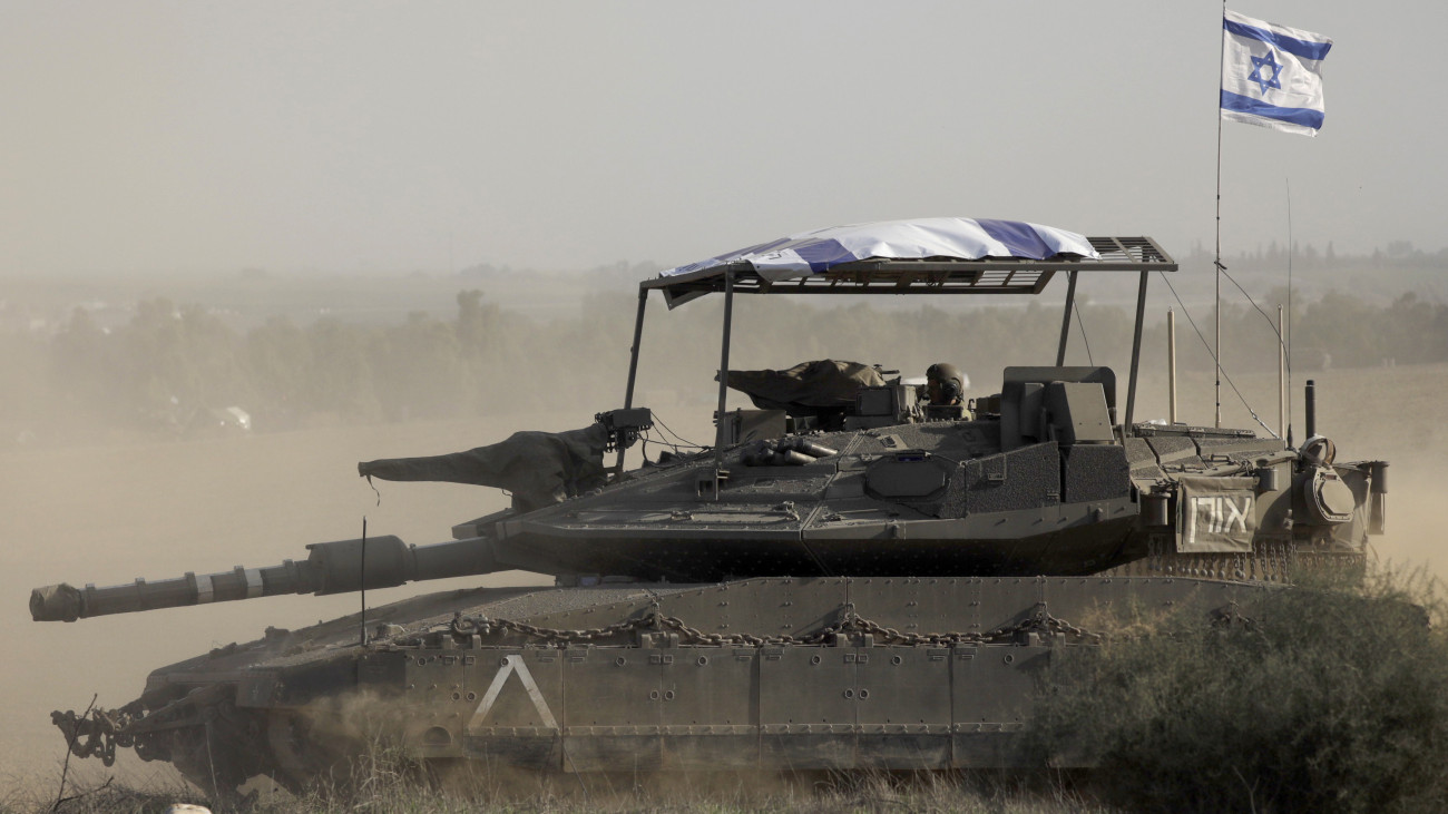 SOUTHERN BORDER, ISRAEL - DECEMBER 02:  An Israeli tank moves near the border with the Gaza strip on December 2, 2023 the southern border of Israel. Israel is resuming military operations in Gaza after a sustained truce between Hamas and Israel did not hold further than a week, despite diplomatic talks and captives released.  (Photo by Amir Levy/Getty Images)