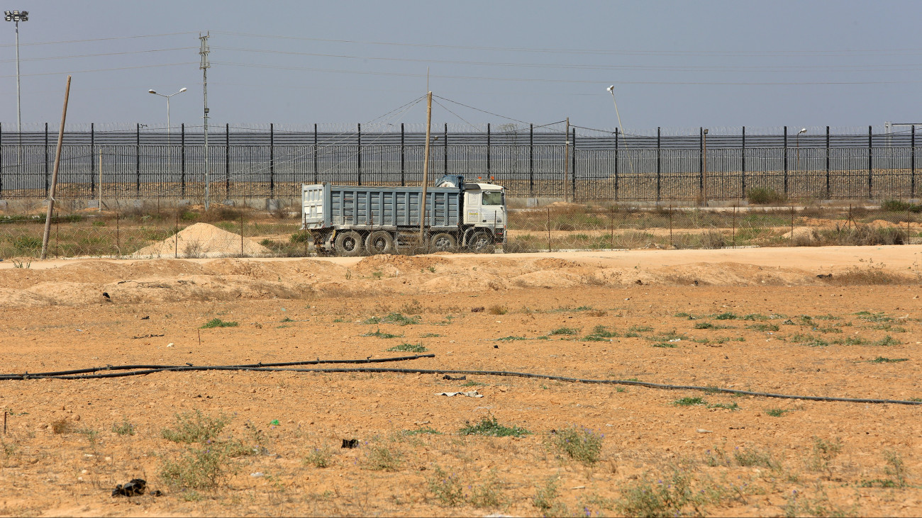 Palestinian trucks in front of the Kerem Shalom commercial crossing after the Israeli ban on Gaza exports dealt a blow to the long-suffering economy, in Rafah in the southern Gaza Strip, on September 5, 2023. (Photo by Abed Rahim Khatib/NurPhoto via Getty Images)