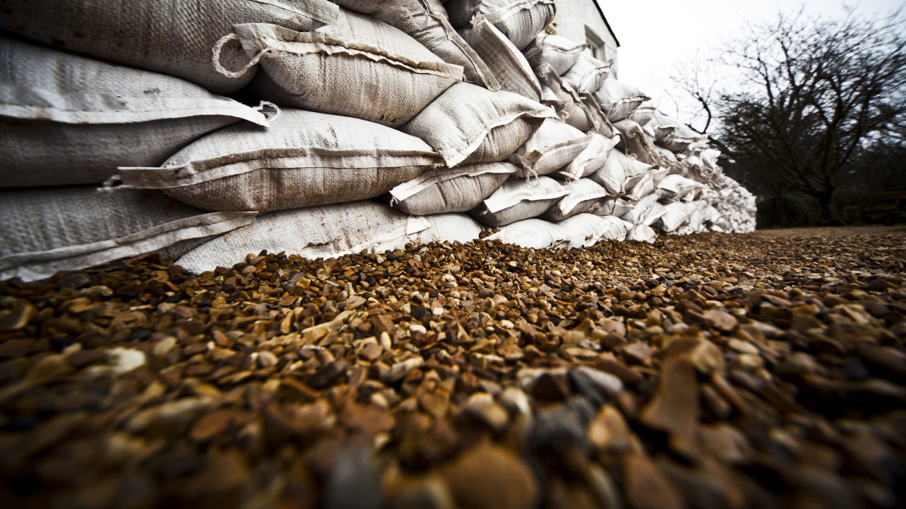 Wall of sand bags to stop flooding.