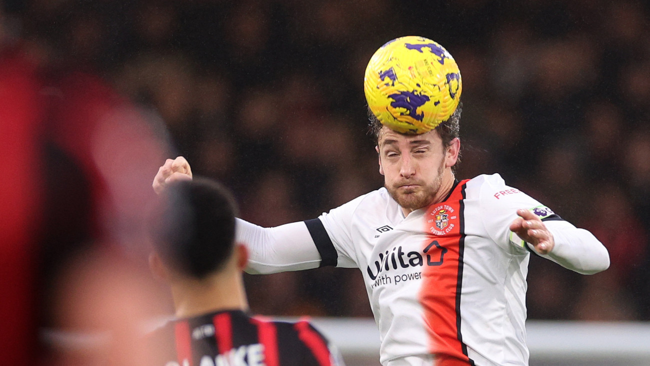 BOURNEMOUTH, ENGLAND - DECEMBER 16: Tom Lockyer of Luton Town contends for the aerial ball during the Premier League match between AFC Bournemouth and Luton Town at Vitality Stadium on December 16, 2023 in Bournemouth, England. (Photo by Warren Little/Getty Images)