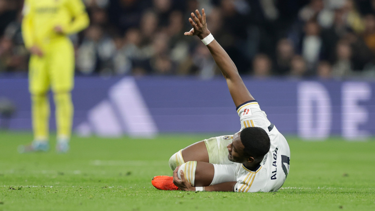 MADRID, SPAIN - DECEMBER 17: David Alaba of Real Madrid injured during the LaLiga EA Sports  match between Real Madrid v Villarreal at the Santiago Bernabeu Stadium on December 17, 2023 in Madrid Spain (Photo by David S. Bustamante/Soccrates/Getty Images)
