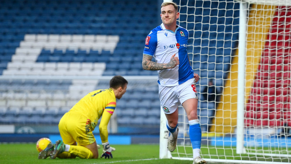 BLACKBURN, ENGLAND - JANUARY 06: Sammie Szmodics of Blackburn Rovers celebrates scoring his teams third goal after completing his hat-trick during the Emirates FA Cup Third Round match between Blackburn Rovers and Cambridge United at Ewood Park on January 06, 2024 in Blackburn, England. (Photo by Gary Oakley/Getty Images)