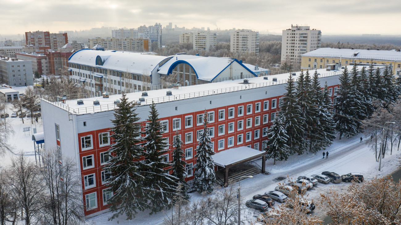 Republic of Bashkortostan, Ufa city in winter: Chernikovka, 3 building of USPTU. Aerial view.