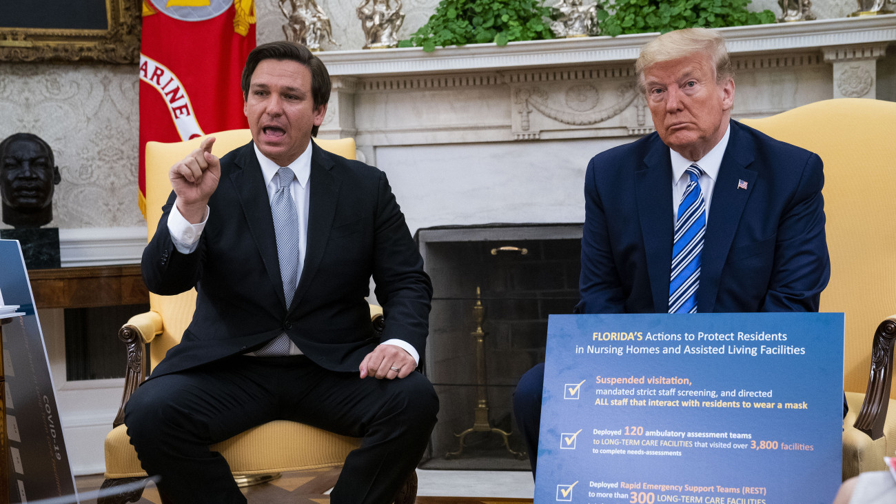 WASHINGTON, DC - APRIL 28: Florida Gov. Ron DeSantis (L) speaks while meeting with U.S. President Donald Trump in the Oval Office of the White House on April 28, 2020 in Washington, DC. Trump met with DeSantis to discuss ways that Florida is planning to gradually re-open the state in the wake of the COVID-19 pandemic. (Photo by Doug Mills/The New York Times/Pool/Getty Images)