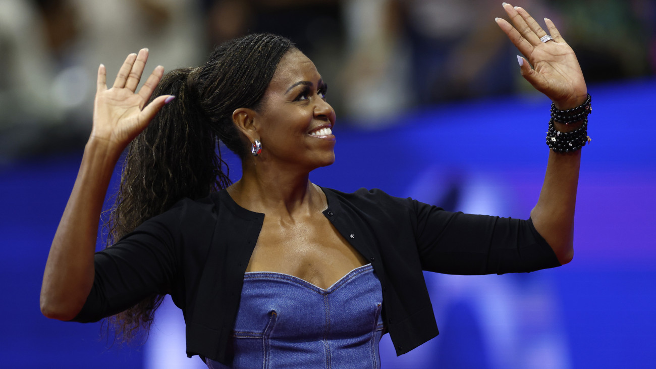 NEW YORK, NEW YORK - AUGUST 28: Former first lady of the United States Michelle Obama is introduced during a ceremony honoring 50 years of equal pay at the U.S Open during the Women/Mens Singles First Round matches on Day One of the 2023 US Open at the USTA Billie Jean King National Tennis Center on August 28, 2023 in the Flushing neighborhood of the Queens borough of New York City. (Photo by Sarah Stier/Getty Images)