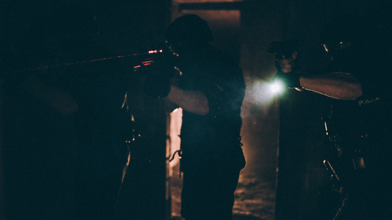 Group of man, special police forces in abandoned house, mission in dark place.