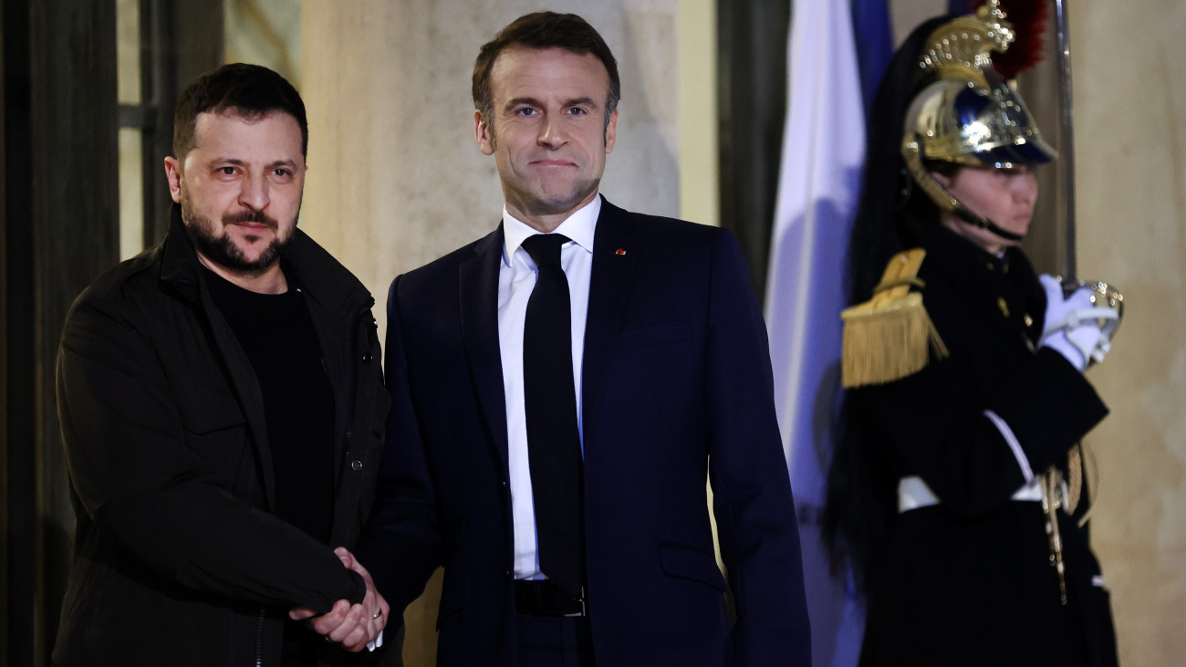 PARIS, FRANCE - FEBRUARY 16: French President Emmanuel Macron welcomes Ukrainian President Volodomyr Zelensky prior to a meeting at the Elysee Presidential Palace on February 16, 2024 in Paris, France. The two heads of state are set to sign a bilateral security agreement, following commitments made in G7 format on the sidelines of the NATO summit in Vilnius in 2023. (Photo by Chesnot/Getty Images)