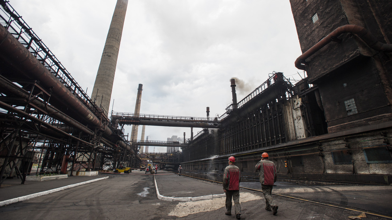 AVDIIVKA, UKRAINE - JULY 28: Workers of the Avdiivka Coke Plant walk through the territory of the plant on July 28, 2015 in Avdiivka, Ukraine. (Photo by Oleksii Furman/Getty Images)