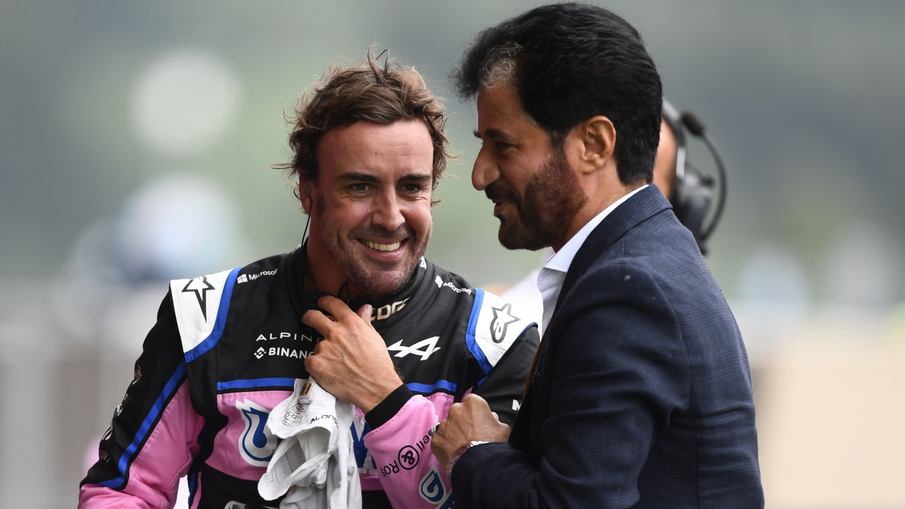 SPA, BELGIUM - AUGUST 27: 6th place qualifier Fernando Alonso of Spain and Alpine F1 talks with Mohammed ben Sulayem, FIA President, in parc ferme during qualifying ahead of the F1 Grand Prix of Belgium at Circuit de Spa-Francorchamps on August 27, 2022 in Spa, Belgium. (Photo by Rudy Carezzevoli/Getty Images)