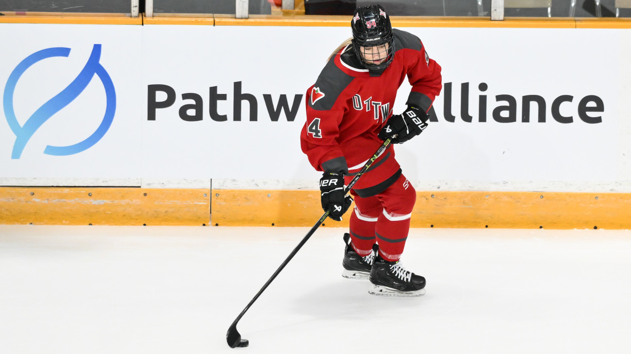 OTTAWA, CANADA - JANUARY 02:  Fanni GarĂĄt-Gasparics #94 of Ottawa skates the puck during warmups prior to the PWHL game against Montreal at The Arena at TD Place on January 2, 2024 in Ottawa, Ontario, Canada.  Montreal defeated Ottawa 3-2 in overtime.  (Photo by Minas Panagiotakis/Getty Images)