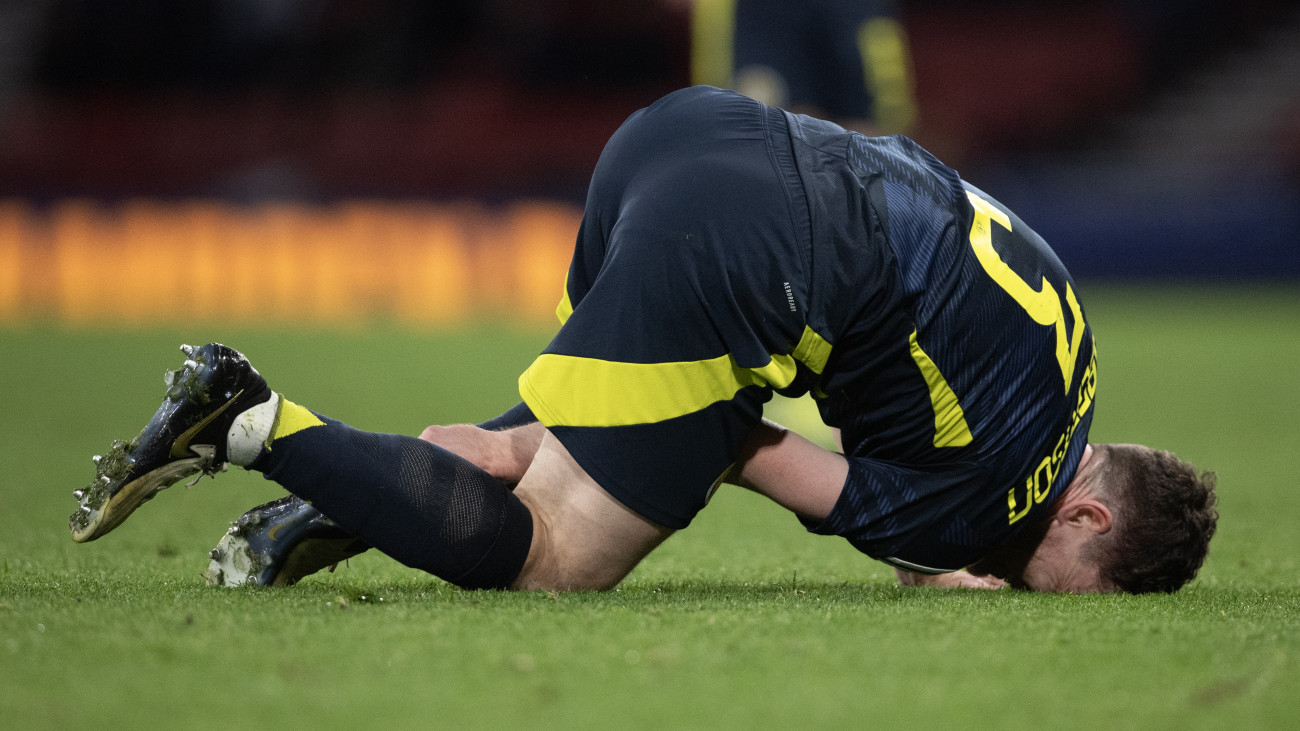 GLASGOW, SCOTLAND - MARCH 26: Andrew Robertson of Scotland goes down injured during the international friendly match between Scotland and Northern Ireland at Hampden Park on March 26, 2024 in Glasgow, Scotland. (Photo by Joe Prior/Visionhaus via Getty Images)