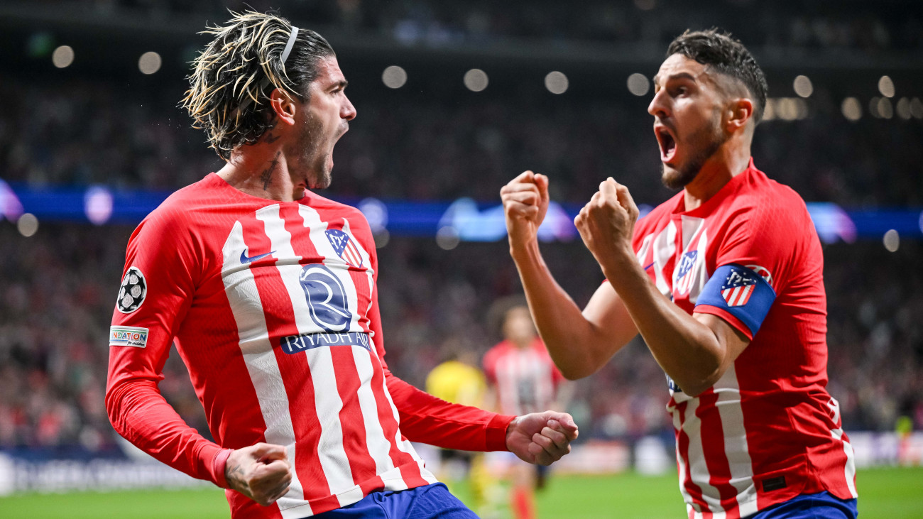 MADRID, SPAIN - APRIL 10: Rodrigo De Paul (L) of Atletico Madrid celebrates with teammate Koke after scoring his teams first goal during the UEFA Champions League quarter-final first leg match between Atletico Madrid and Borussia Dortmund at Civitas Metropolitano Stadium on April 10, 2024 in Madrid, Spain. (Photo by Harry Langer/DeFodi Images via Getty Images)